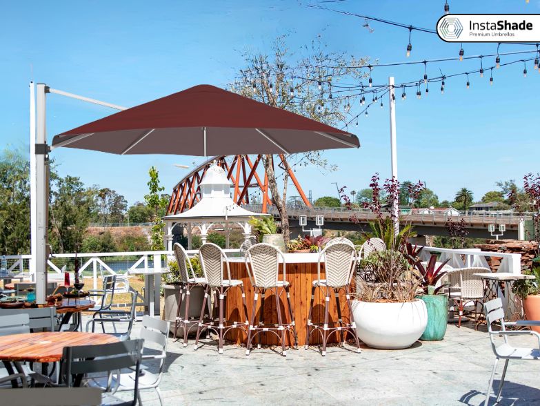 Cantilever Umbrella Withstanding Wind on A Cafe Terrace